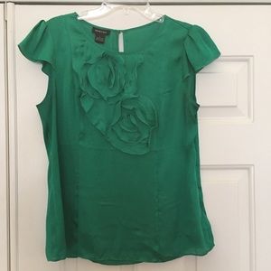 Green sleeveless blouse